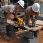 construction_workers_laborers_contractor_job_site_industrial_building-746988